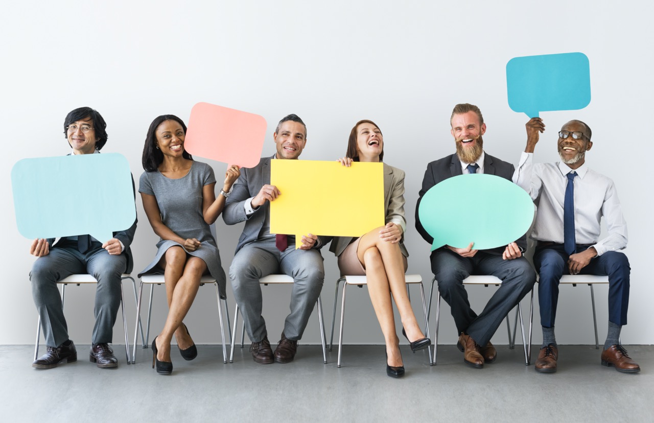 Business Team Speech Bubble Holding Concept Business Team Speech Bubble Holding Concept